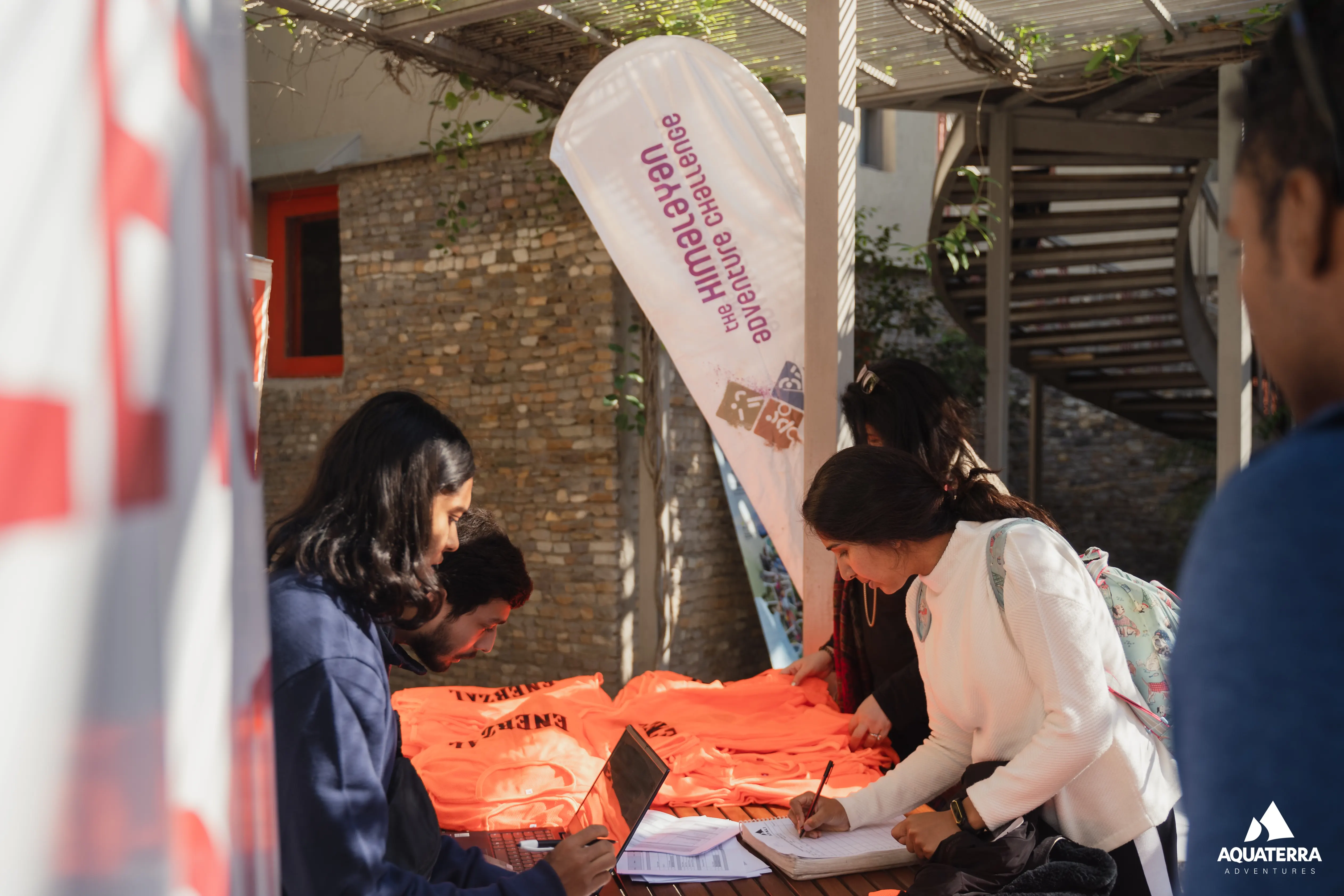 HAC event coordination team checking in participants at the registration desk